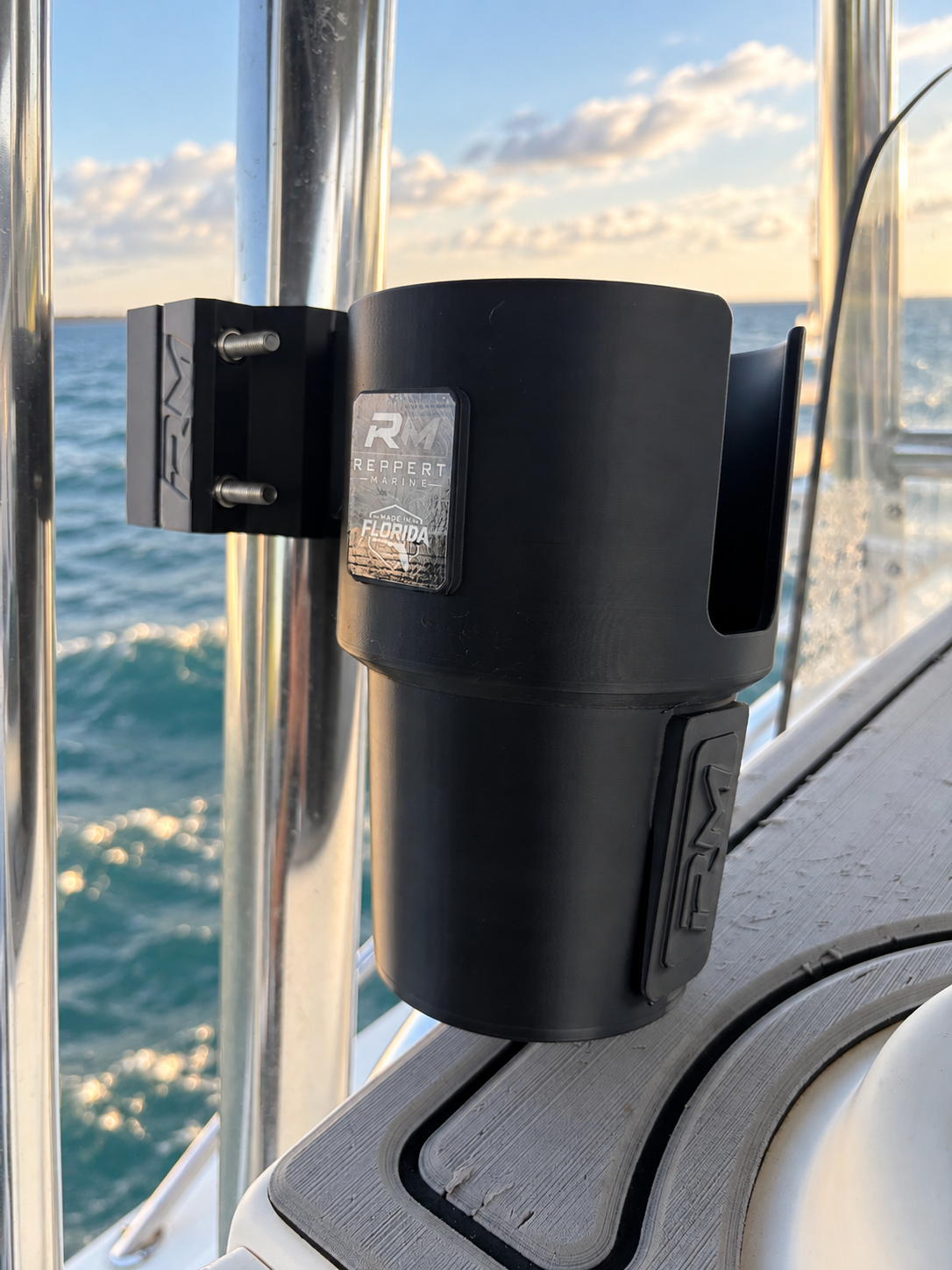 Black RepRail cupholder kit with RM1 Solo clamp installed on stainless T-top tubing