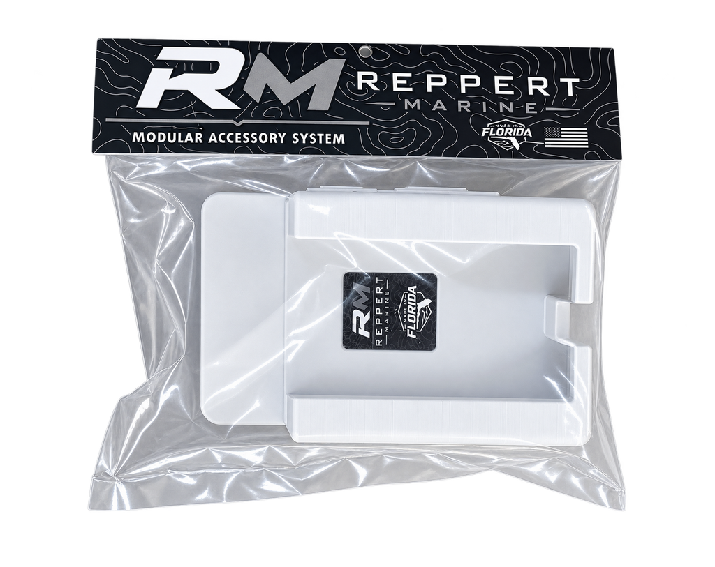 White RepRail universal boat phone holder in retail packaging with Reppert Marine branding