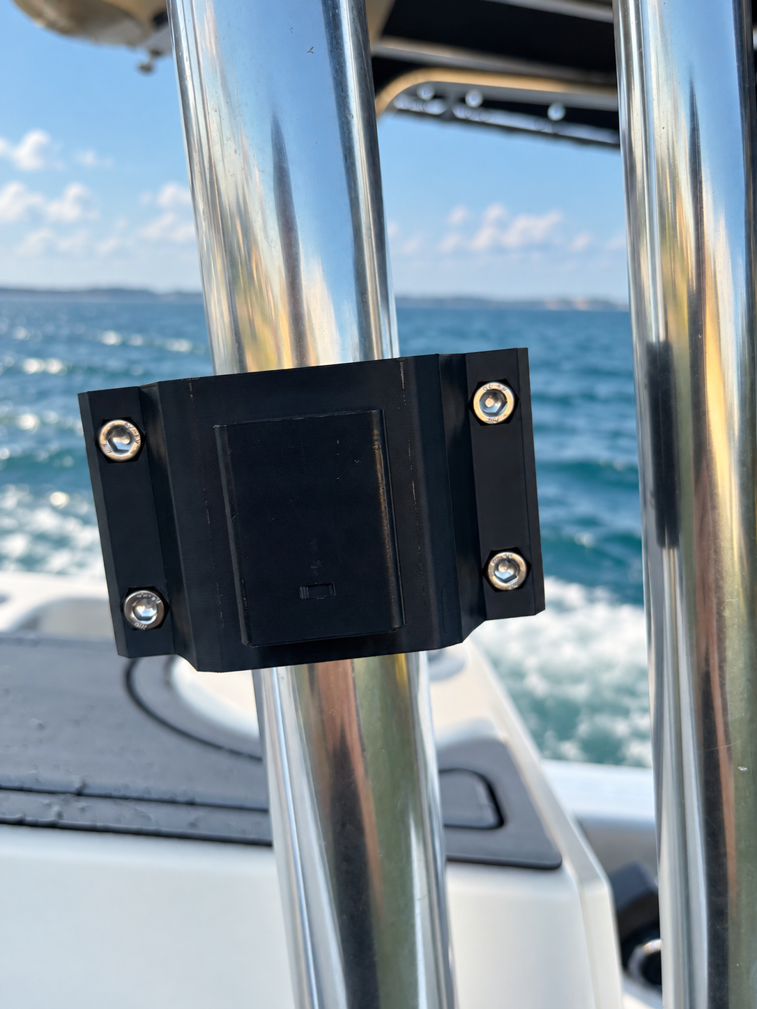 Black RepRail RM1 Dual boat rail clamp installed on stainless T-top tubing