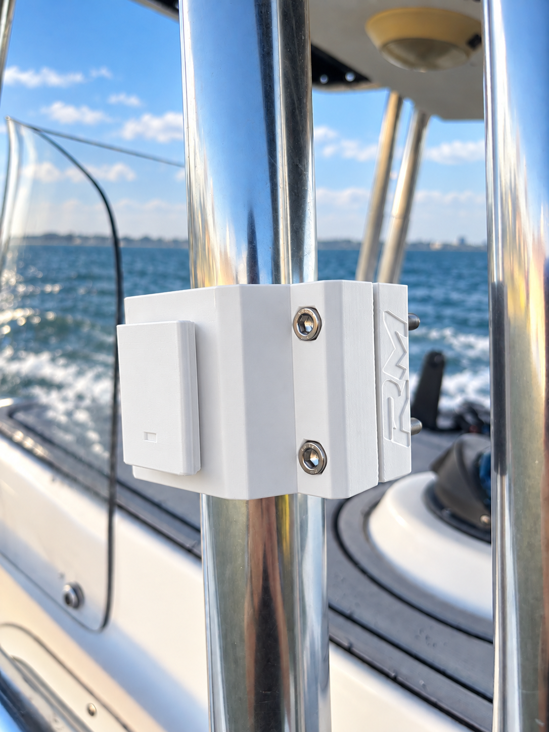 White RepRail RM1 Dual boat rail clamp mounted on stainless T-top tubing, side view