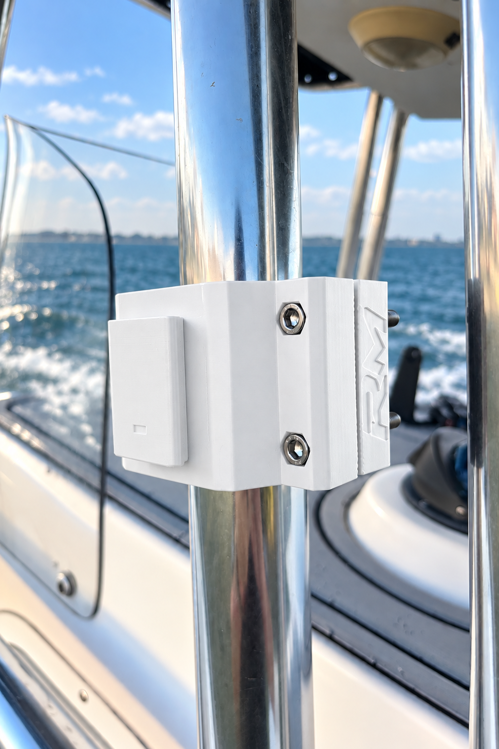 White RepRail RM1 Solo boat rail clamp mounted on stainless T-top tubing, side view